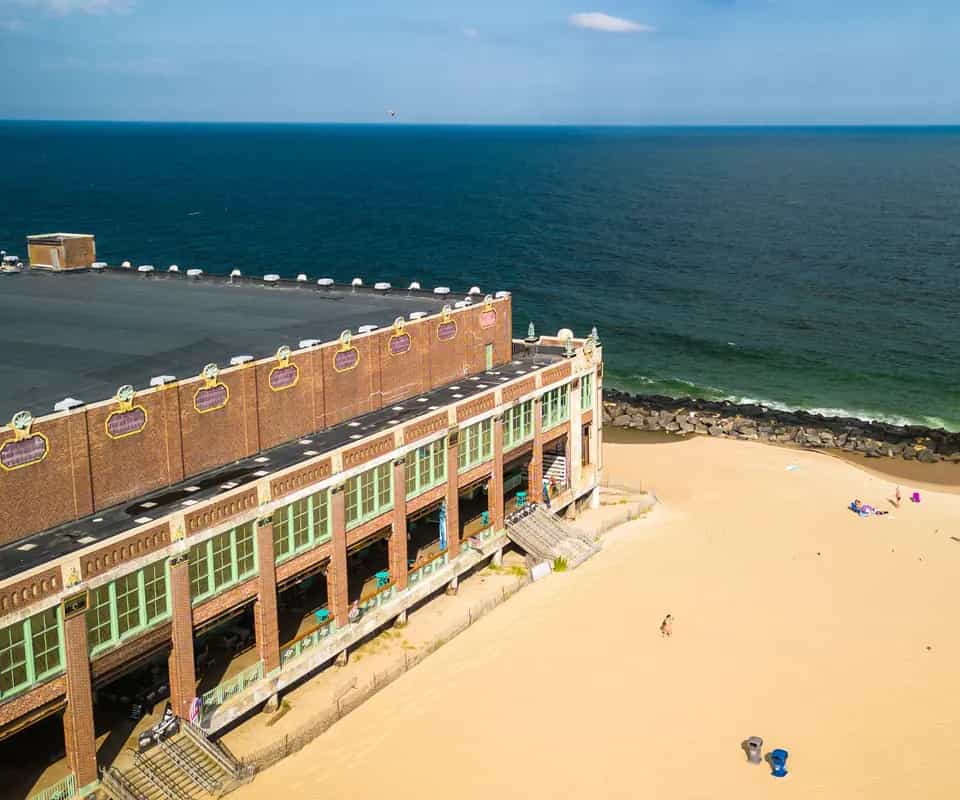 Convention Hall on the Asbury Park boardwalk above the beach and the Atlantic
