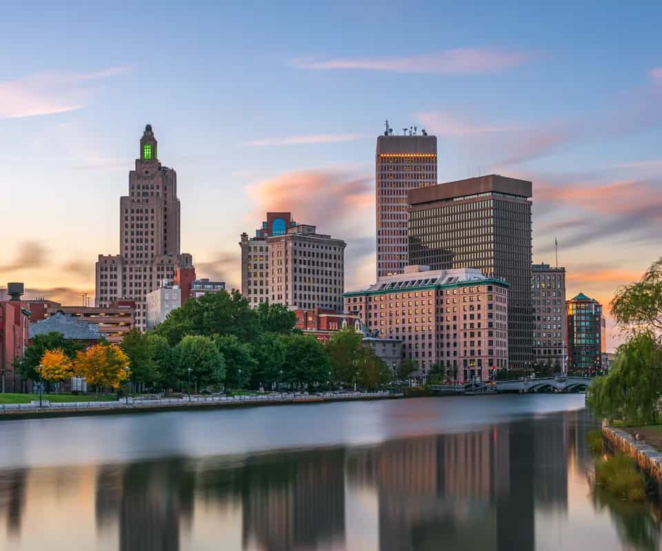 Downtown Providence reflected in the river at sunset